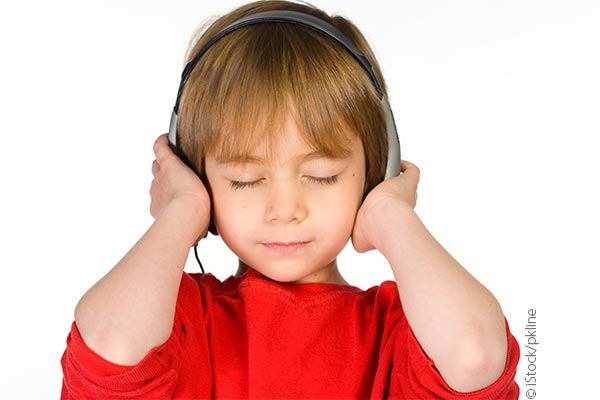 boy using headphones