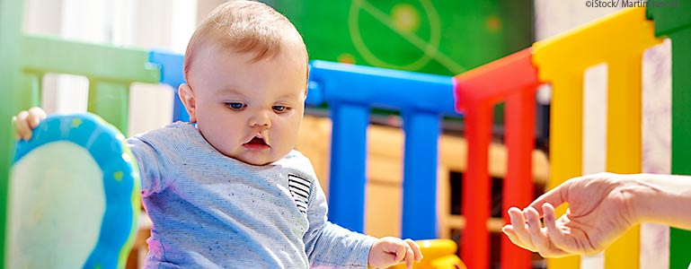 baby in playpen