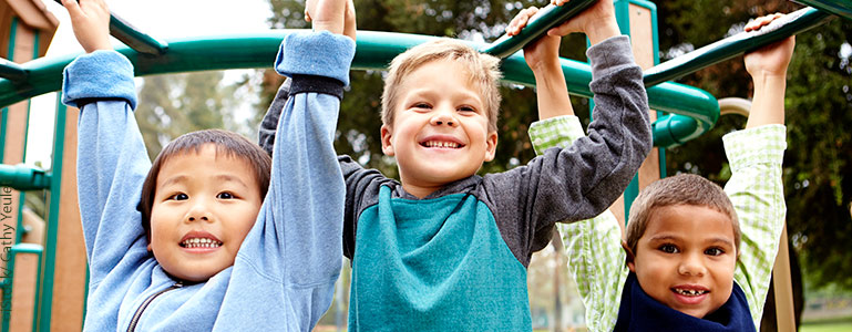 Kids on monkeybars