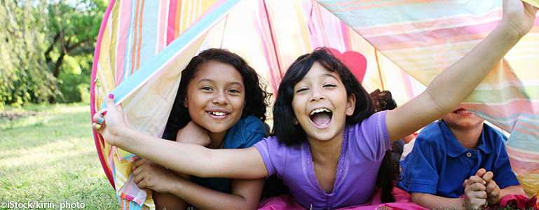 Kids playing in tent