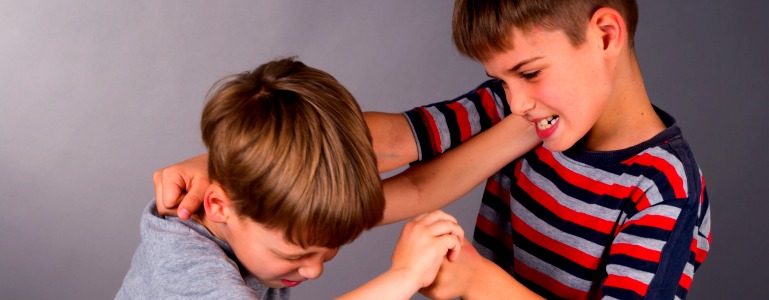 two boys fighting