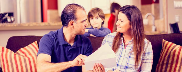 parents having a disagreement in front of child