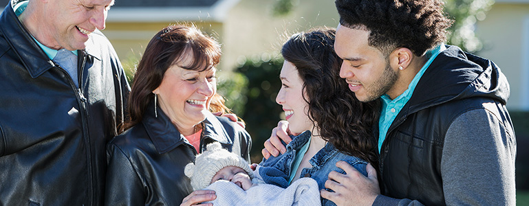 grandparents, parents, and new baby