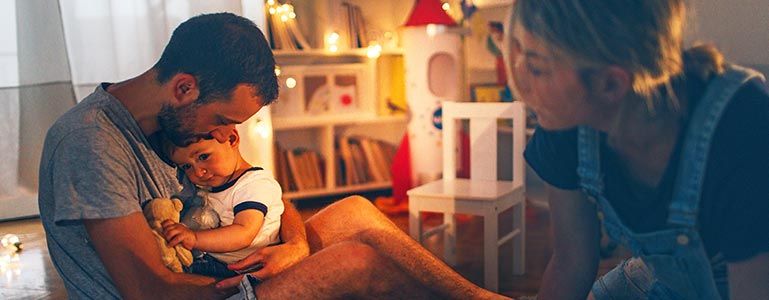 Parents comforting child