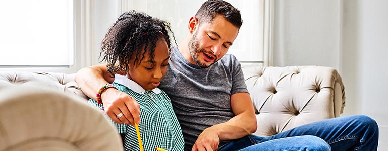 Parent talking with daughter about homework