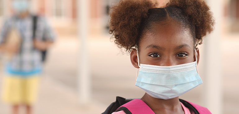 girl wearing mask