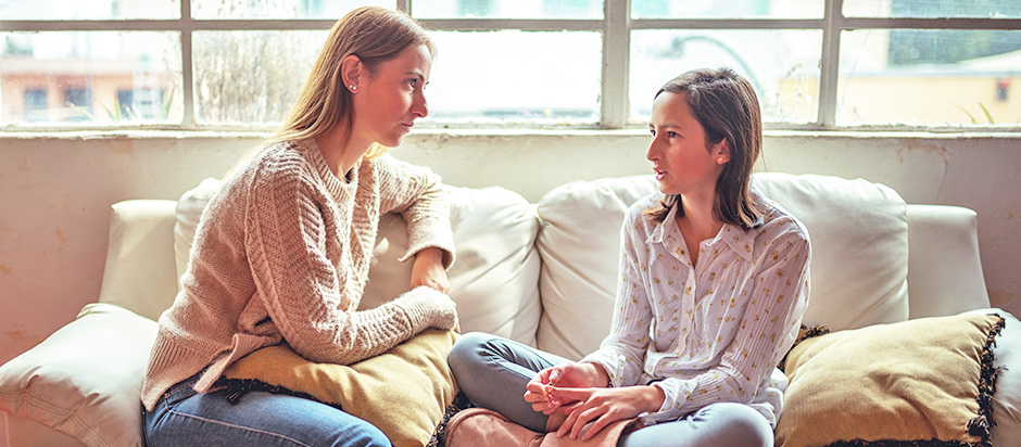 mom talking to daughter